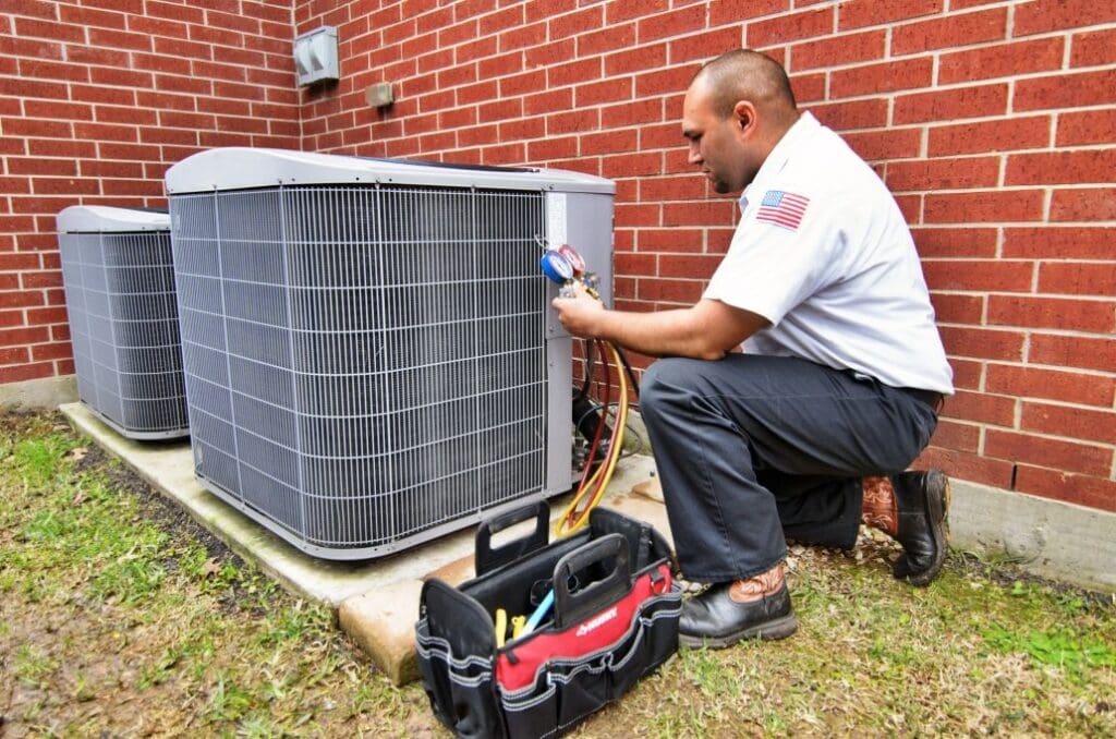 technician performing an AC tune-up