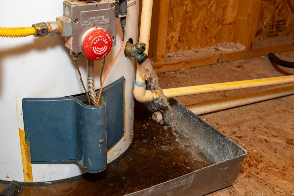 water gushing out of water heater drain