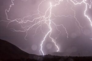 Lightning bolt across the purple sky